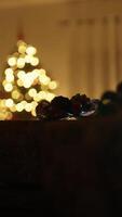 Silhouette Of Christmas Presents Resting By Hand In Front Of Tree At Night video
