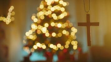 Religious Crucifix In Front Of Christmas Tree Copy Space Background video
