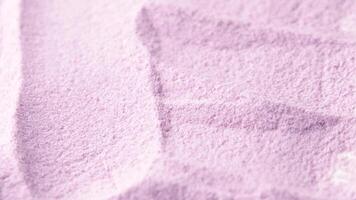 Pink matcha latte texture. Taro latte with coconut creamer and sugar texture, slow motion video