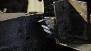 Building reinforcement is cut on a machine video