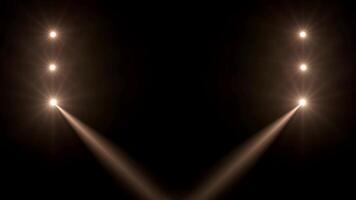Spotlight optical lens flares overlay shine effect on a black background. video