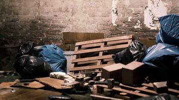 Cluttered basement with trash and old items in a run down building video