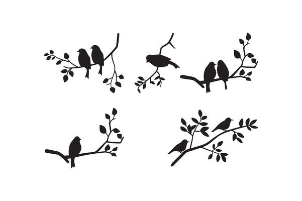 Set of birds at tree branches silhouettes.