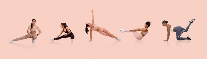 Five women are engaged in diverse stretching exercises, showcasing flexibility and strength. The workout takes place in a brightly lit studio with a soft pink backdrop. photo