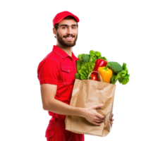 Smiling delivery man with red uniform holding a shopping bag full of vegetable side view isolate on transparency background png