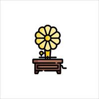 A flower on a table with a light bulb vector