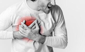 Man has hurt in chest, highlighted in red, cropped photo