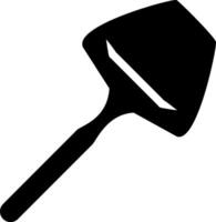 A black and white silhouette of a shovel vector