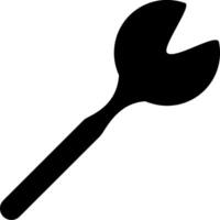 A black and white icon of a wrench vector