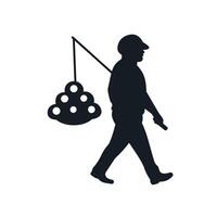 Silhouette of a worker carrying a load while walking along a pathway at dusk vector