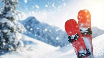Snowboard resting on pristine snow at sunset in a mountain landscape photo