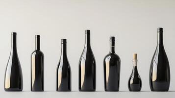 A collection of elegantly shaped natural wine bottles is displayed on a simple backdrop. Their varied silhouettes create a striking visual contrast, showcasing the artistry in wine packaging. photo
