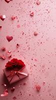 Colorful gift box surrounded by rose petals and heart shapes for celebration photo