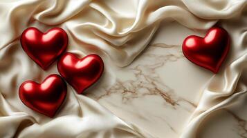 Decorative arrangement of red hearts on luxurious fabric and marble surface during celebration photo