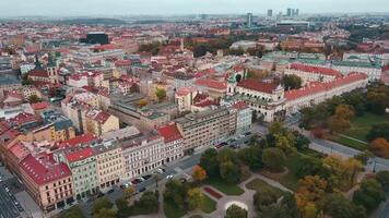 Prague architecture, aerial view. Flight over historical buildings with red roofs in European city. Birds eye view of cityscape of Praha, Czech Republic video