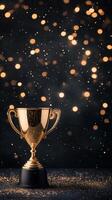 Golden trophy with bokeh lights on a dark background during a celebration event photo