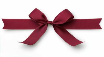 Elegant red ribbon displayed on a white background for gift wrapping or decoration projects photo