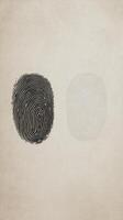 Unique fingerprint designs showcasing contrast between dark and light tones on a textured background photo