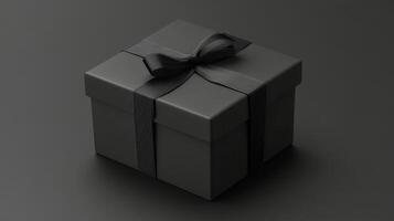 Elegant black gift box with ribbon displayed on a dark background photo
