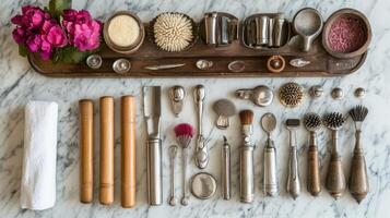 A tray with various tools and utensils on a marble counter photo