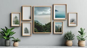 A wall with several framed pictures and plants photo
