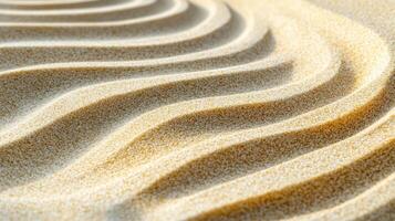 A close up of sand with waves in it photo