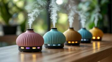 Five different colored vases with smoke coming out of them photo