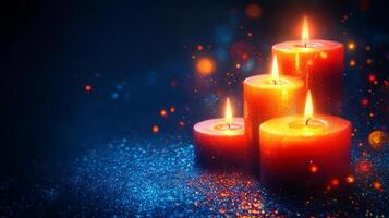 Three burning candles on a dark background photo