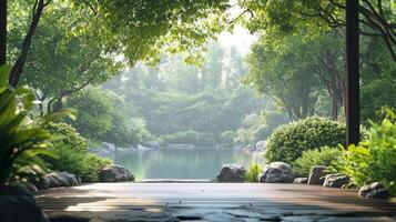 A walkway leads to a pond surrounded by trees photo