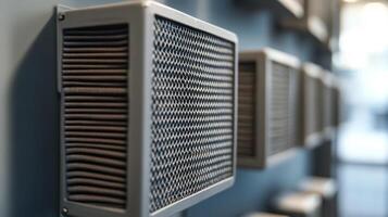 Close-up of modern air filters mounted on a wall, emphasizing design and functionality. photo