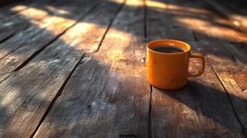 A coffee cup on a wooden table photo