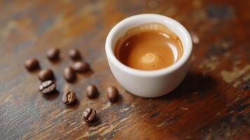 Espresso coffee beans on a wooden table photo