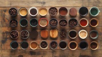 Coffee beans in bowls on a wooden table photo
