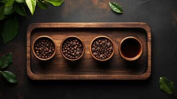 Coffee beans in wooden bowls on a dark background photo