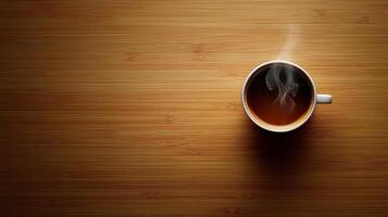 A cup of coffee on a wooden table photo