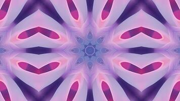 A symmetrical, abstract pattern featuring soft colors and star-like shapes. video
