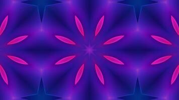 A vibrant, symmetrical star pattern in pink, purple, and blue, creating a visually striking design. video