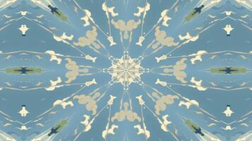 A symmetrical design featuring a floral pattern against a deep blue background. video