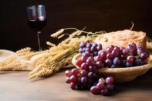 Rustic still life with wine, grapes, and wheat photo