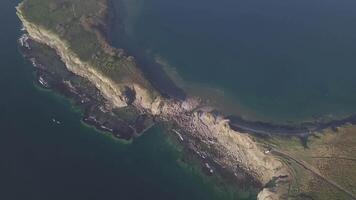Drone view of a beautiful peninsula Tobizina with vertical cliffs at sunrise video