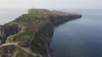 Drone view of a peninsula Tobizina with vertical cliffs at sunrize. video