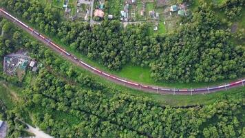 Drone view of a moving freight train in the suburbs of Vladivostok video