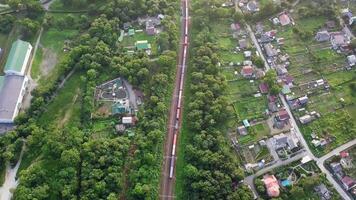 Drone view of a moving freight train in the suburbs of Vladivostok video