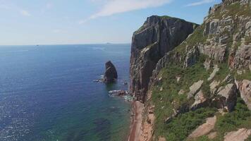 View from a drone of the coastline with a rocky coast and rocks video