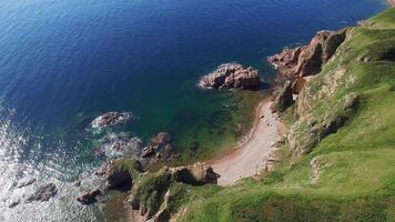 View from a drone of the coastline with a rocky coast and rocks video