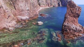 View from a drone of the coastline with a rocky coast and rocks video