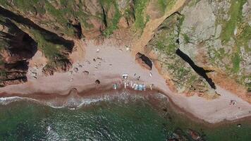 View from a drone of the coastline with a rocky coast and hight cliffs video