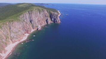 View from a drone of the coastline with a rocky coast and hight cliffs video