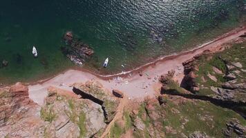 View from a drone of the coastline with a rocky coast and hight cliffs video