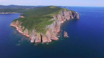 View from a drone of the coastline with a rocky coast and hight cliffs video
